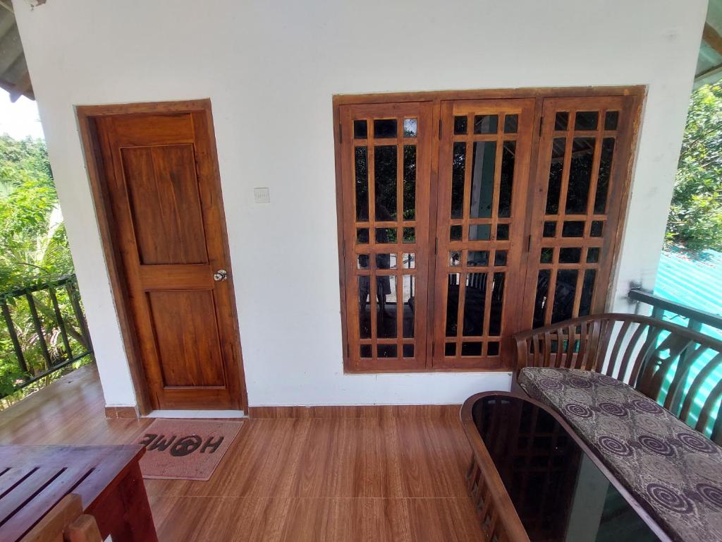 Balkón nebo terasa v ubytování Habarana Dulwan Guest House