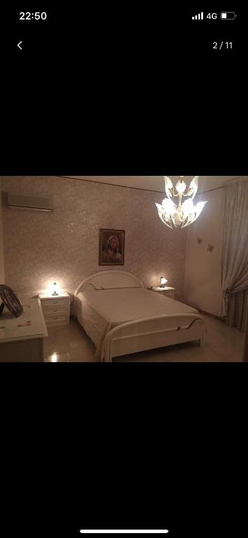 Posteľ alebo postele v izbe v ubytovaní Villa con piscina "Pumo"