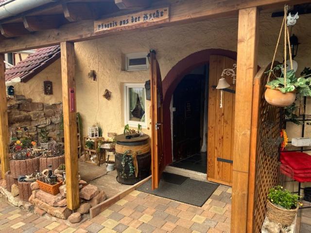 an entrance to a house with a door open at Phönix aus der Asche in Rhodt unter Rietburg