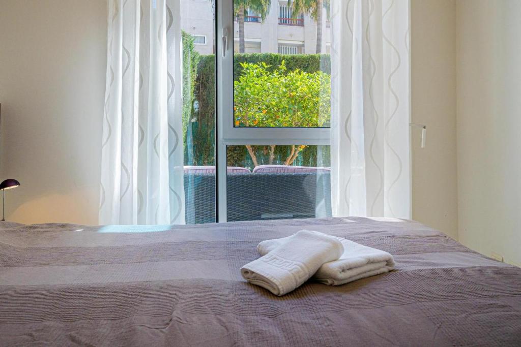 A bed or beds in a room at Estrella 23BH