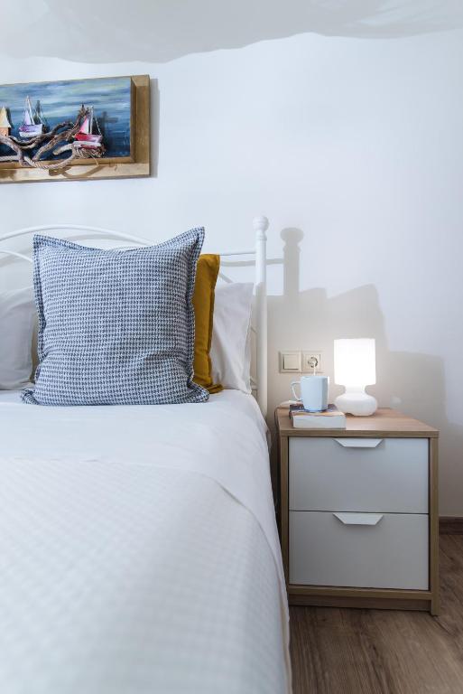 Posteľ alebo postele v izbe v ubytovaní Alkinoos Apartment
