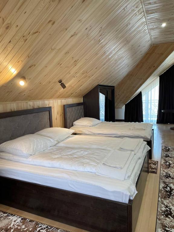 Postel nebo postele na pokoji v ubytování Hotel Ashad