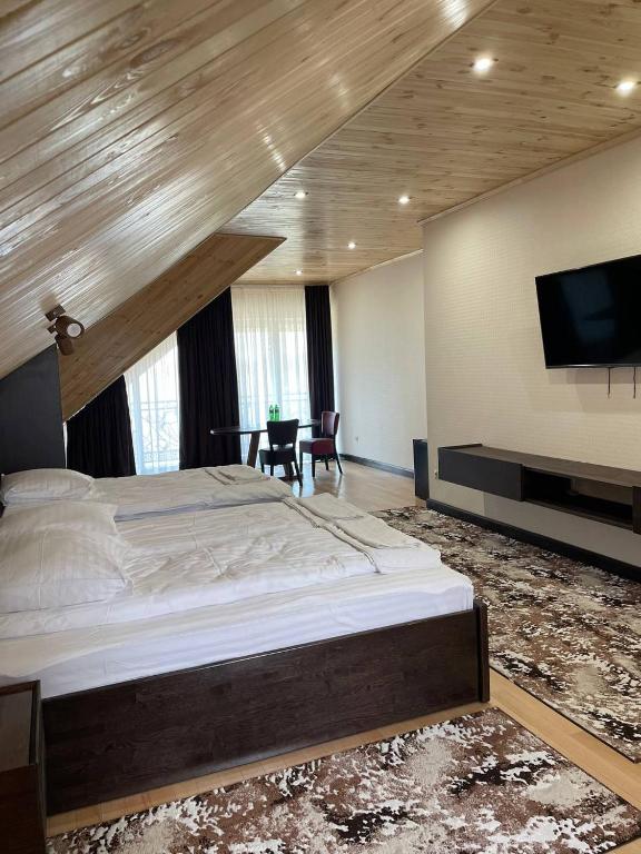 Postel nebo postele na pokoji v ubytování Hotel Ashad