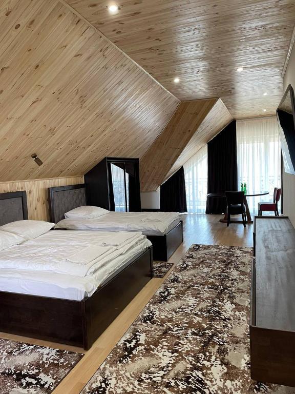 Postel nebo postele na pokoji v ubytování Hotel Ashad