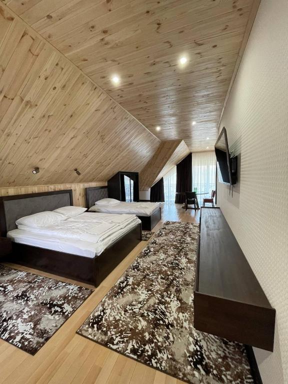Postel nebo postele na pokoji v ubytování Hotel Ashad