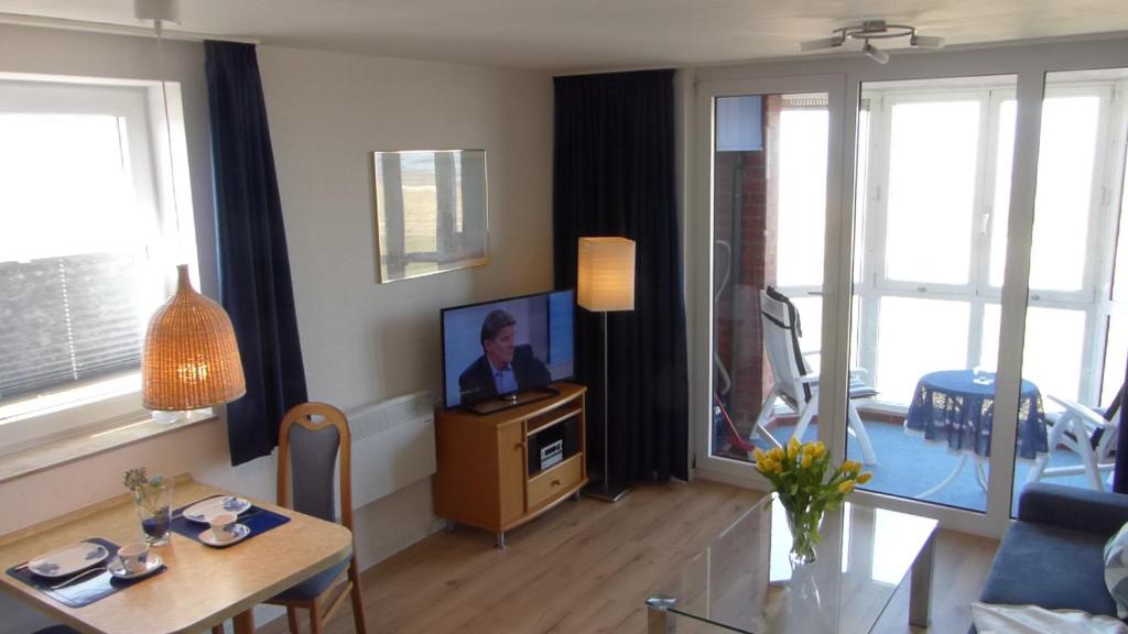 TV a/nebo společenská místnost v ubytování Haus Horizont Fewo Nr. 4