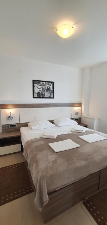 Postel nebo postele na pokoji v ubytování Apartments Lofiel