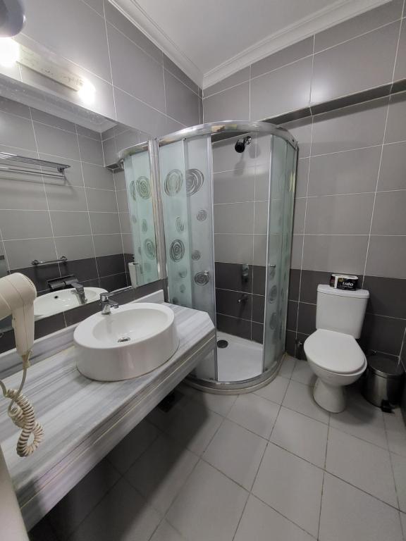 Koupelna v ubytování Regency Hotel