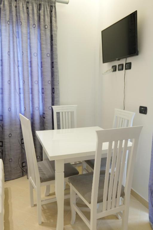 TV a/nebo společenská místnost v ubytování Hotel Dior