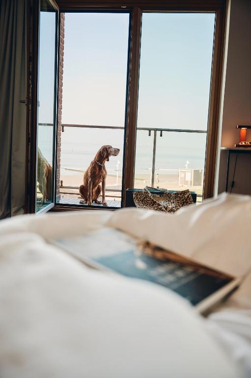Postel nebo postele na pokoji v ubytování Hotel Haus am Meer