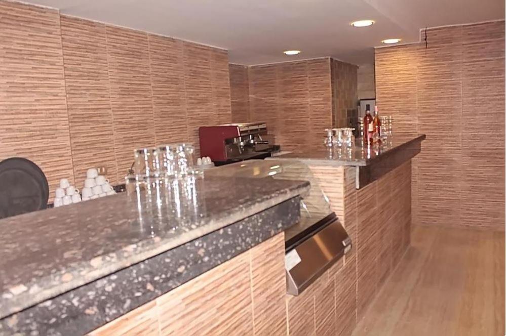 Kuchyň nebo kuchyňský kout v ubytování Regency Hotel