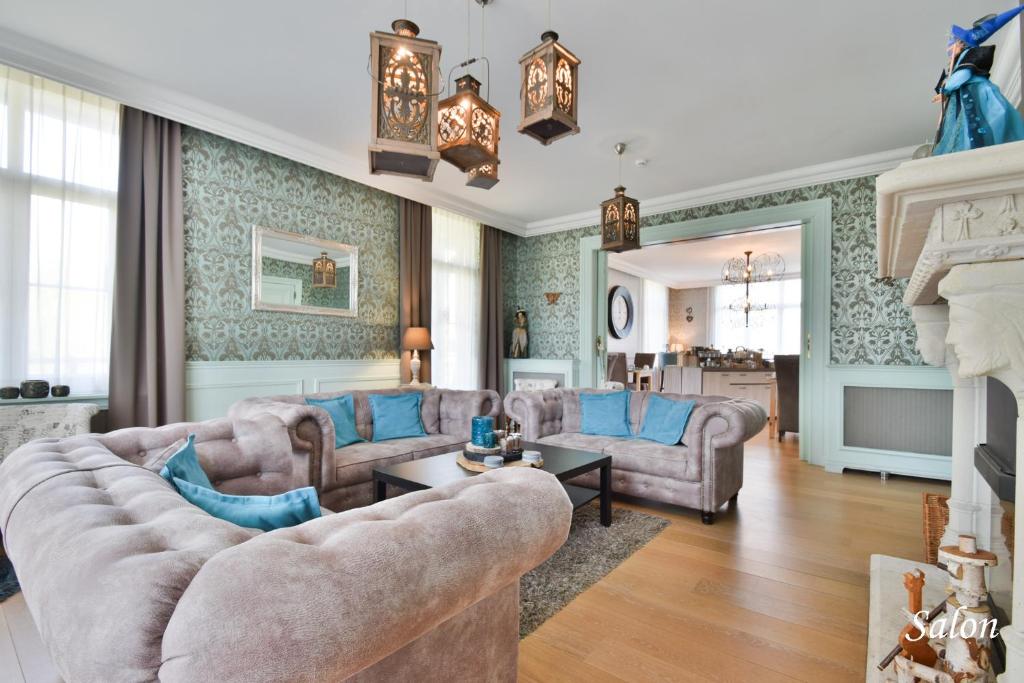 O zonă de relaxare la Hôtel l'Ecrin d'Ô