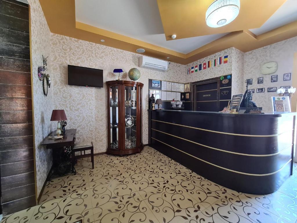 TV a/nebo společenská místnost v ubytování Garni Hotel & Spa Nicolo