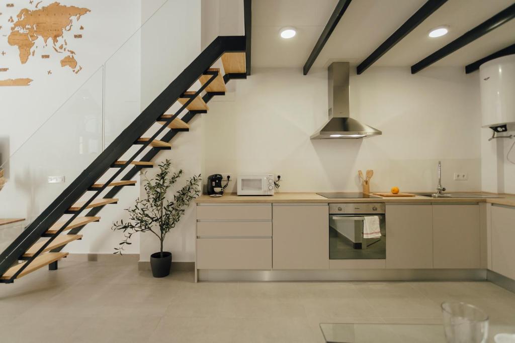 Kuchyň nebo kuchyňský kout v ubytování Tu casa duplex en Triana