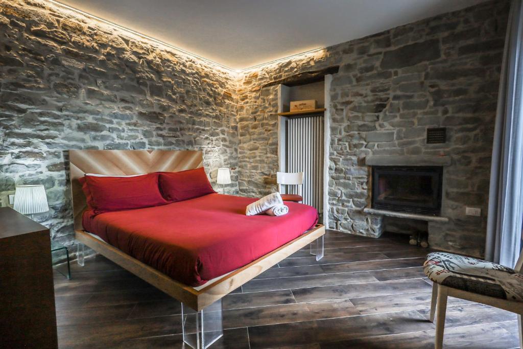 Postel nebo postele na pokoji v ubytování Albergo del Bramante