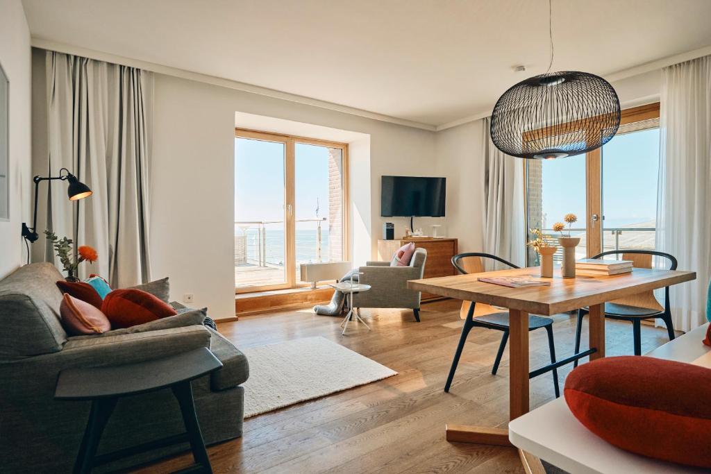 TV a/nebo společenská místnost v ubytování Hotel Haus am Meer