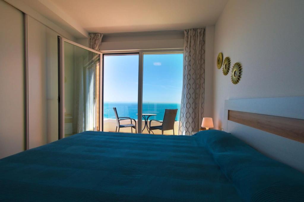 Postel nebo postele na pokoji v ubytování SUNNY DAY APARTMENT CALACEITE