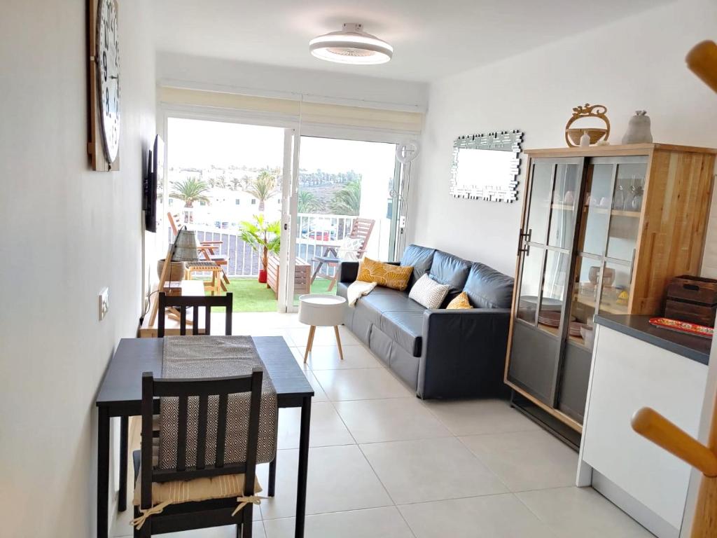 Posezení v ubytování Apartment Aqui Todo Empieza - Pool view - Free WiFi - smart TV-Residence Senator