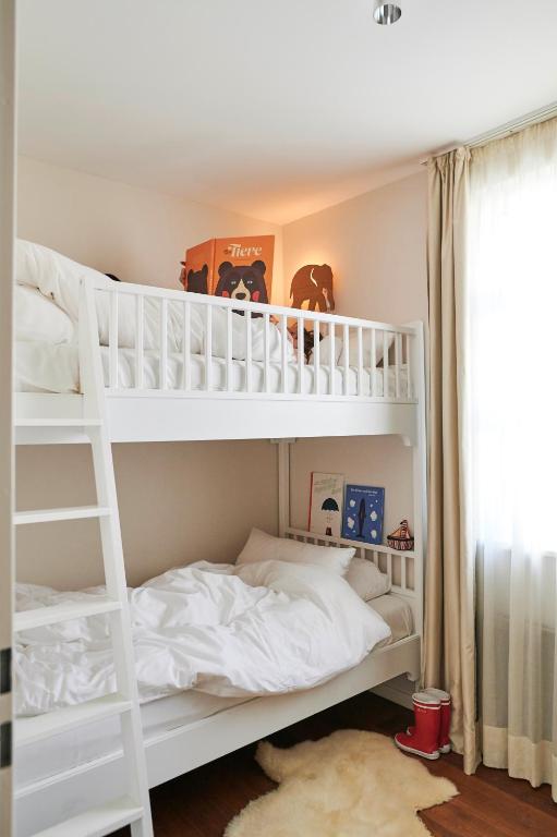 Postel nebo postele na pokoji v ubytování Hotel Haus am Meer