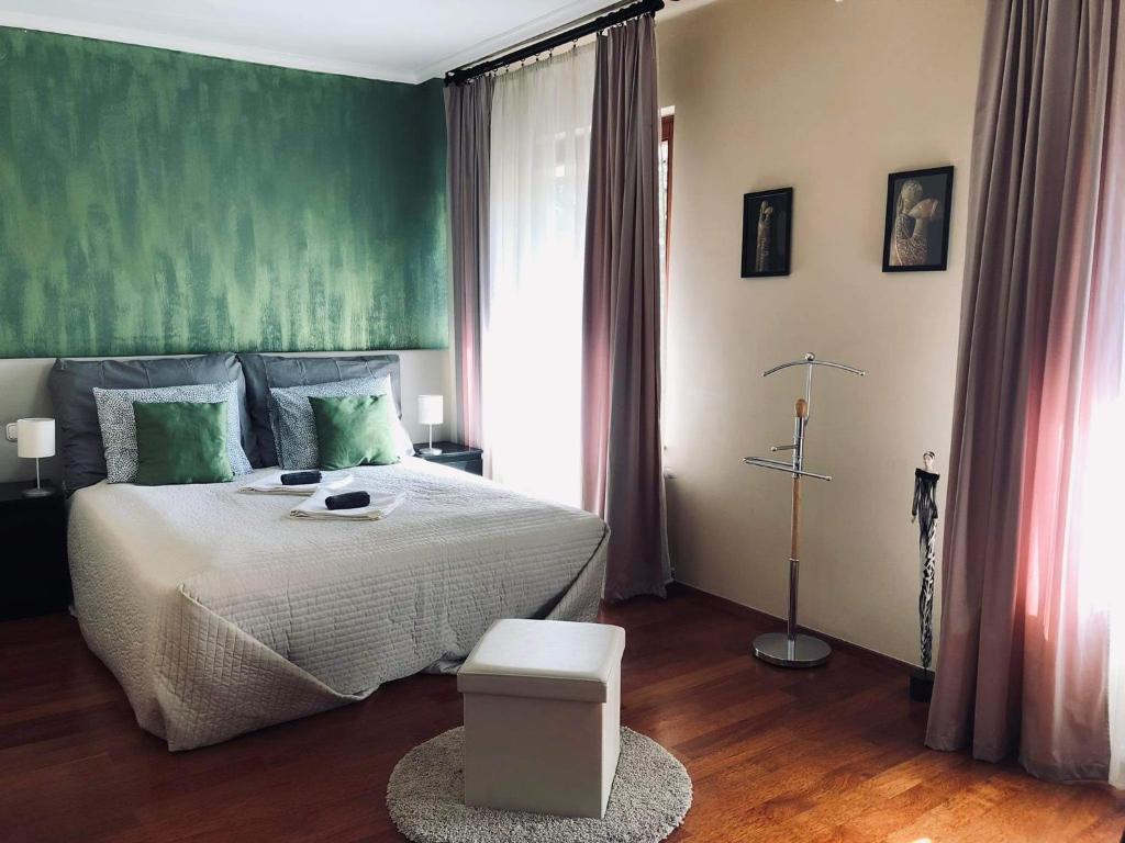 Postel nebo postele na pokoji v ubytování Atrium Panzio