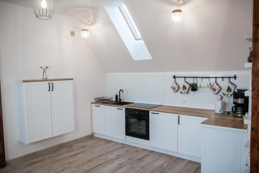 Kuchyňa alebo kuchynka v ubytovaní Apartament Uleczka by Rentoom