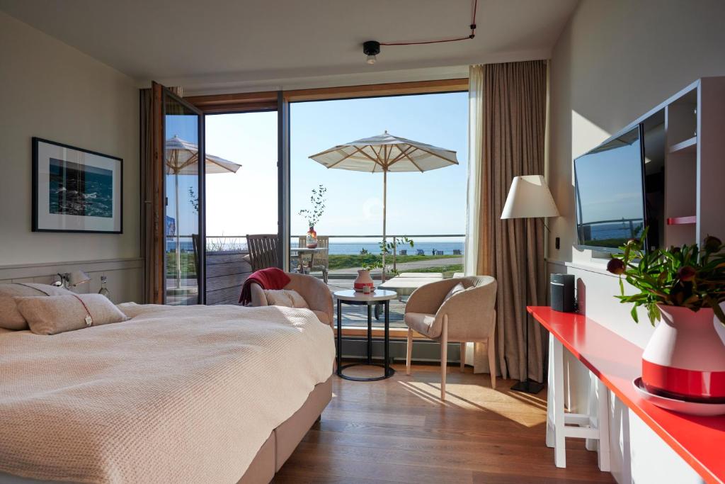 Postel nebo postele na pokoji v ubytování Hotel Haus am Meer