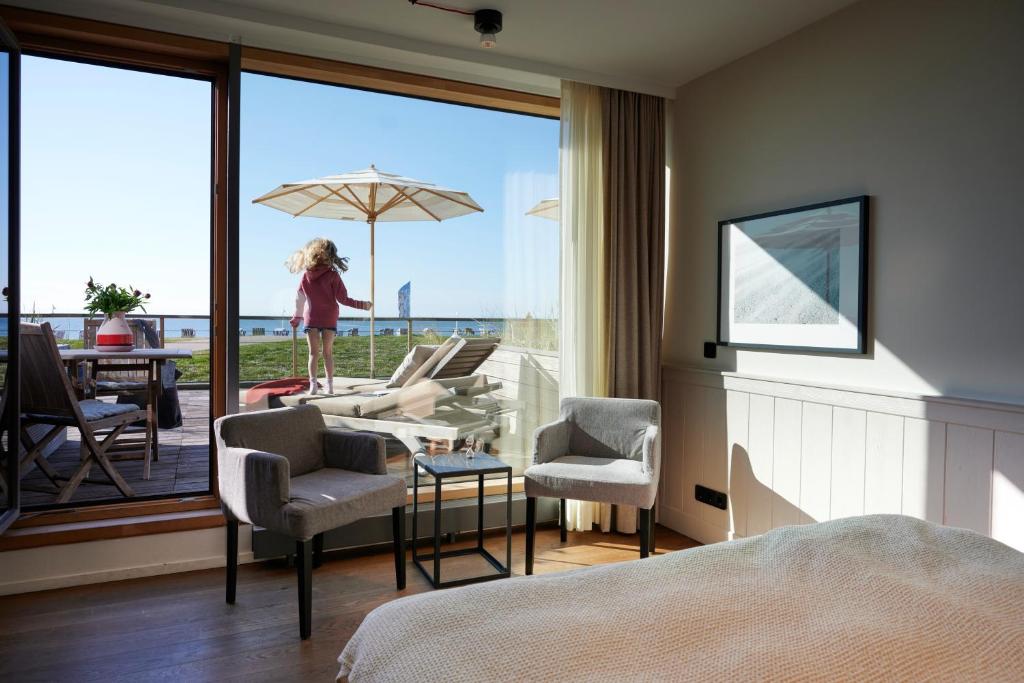 Posezení v ubytování Hotel Haus am Meer