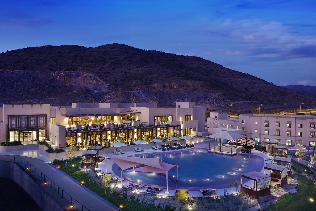 A view of the pool at dusitD2 Naseem Resort, Jabal Akhdar, Oman or nearby