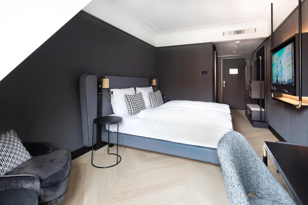 Ένα ή περισσότερα κρεβάτια σε δωμάτιο στο Hotel Schillerhof, Weimar