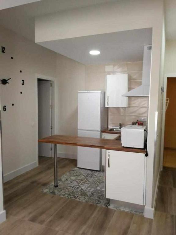 Kuchyň nebo kuchyňský kout v ubytování KubiK APARTAMENTOS K2