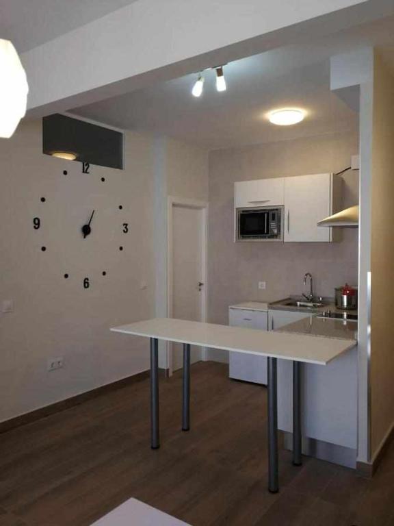 Kuchyň nebo kuchyňský kout v ubytování KubiK APARTAMENTOS K2