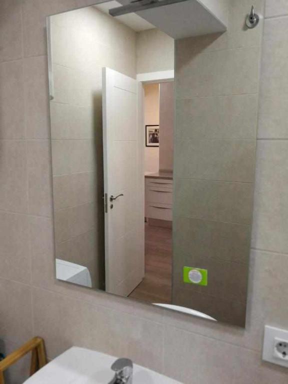 Koupelna v ubytování KubiK APARTAMENTOS K2