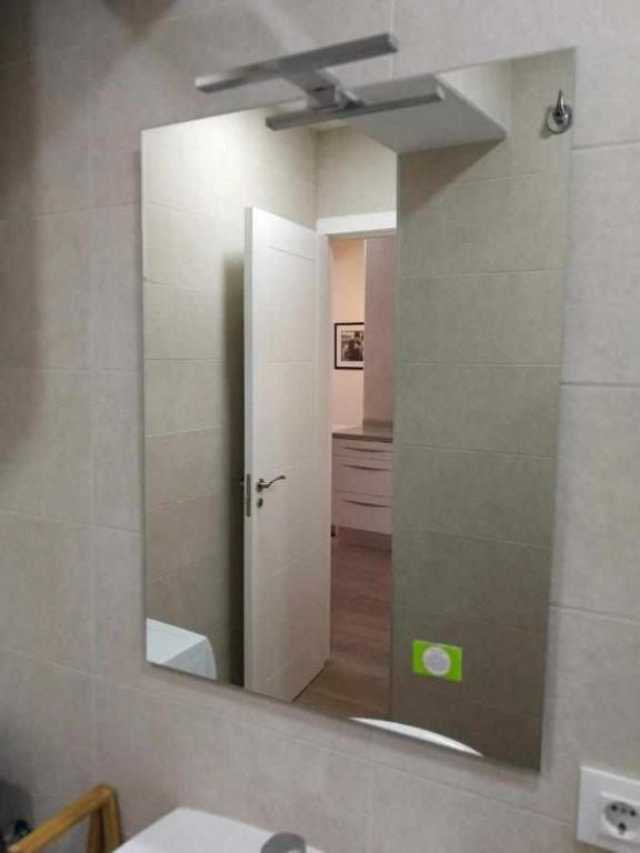 Koupelna v ubytování KubiK APARTAMENTOS K2