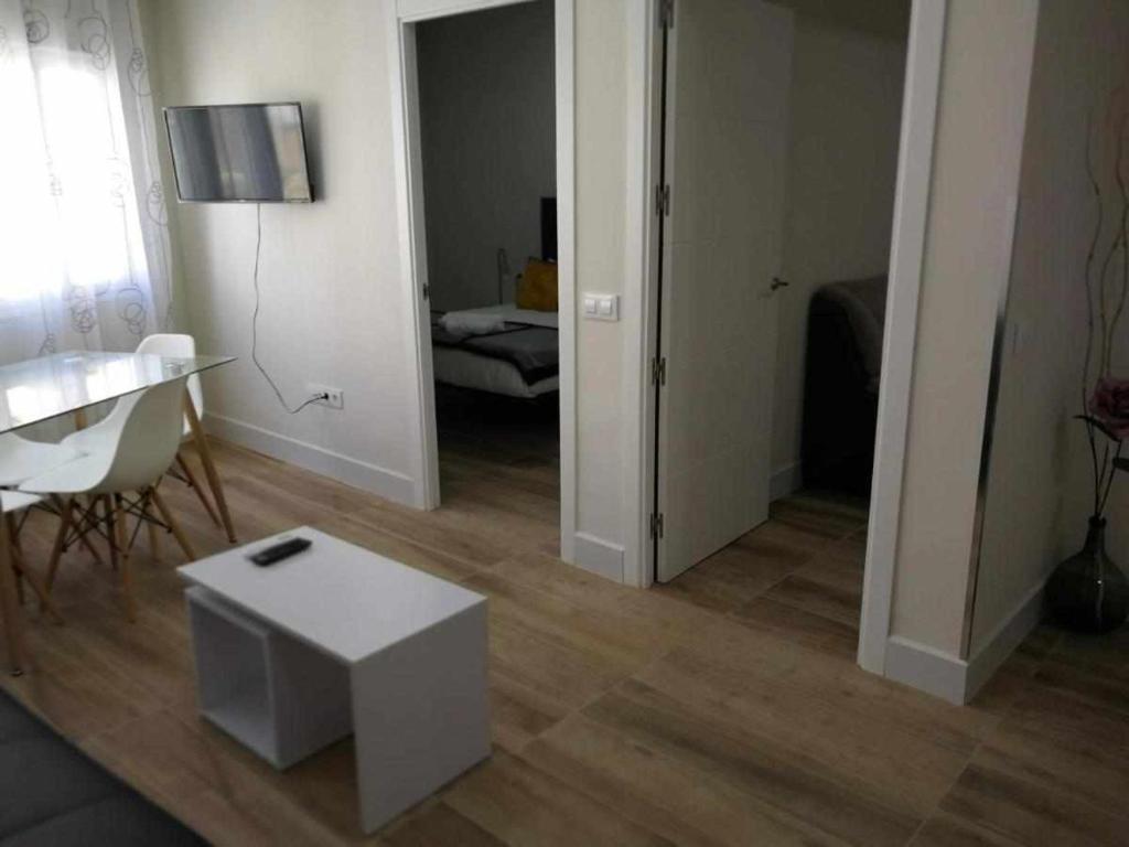 Postel nebo postele na pokoji v ubytování KubiK APARTAMENTOS K2