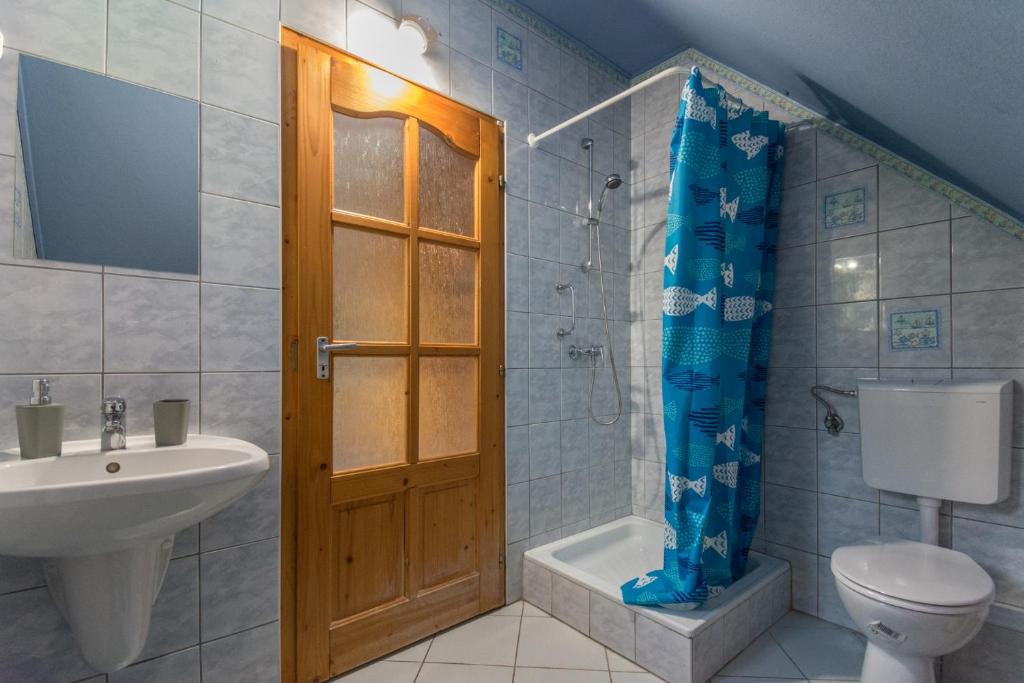 Koupelna v ubytování 101 Apartman Agárd,Török Bálint utca 101