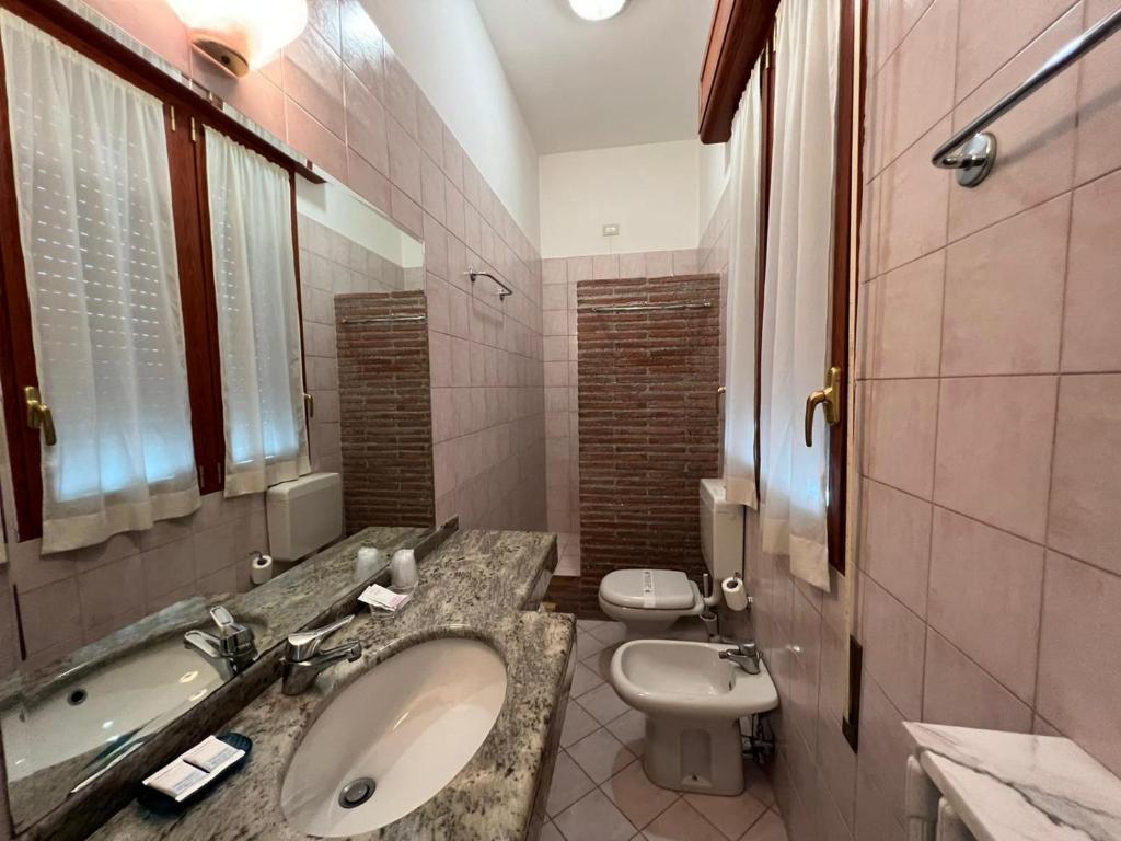 Koupelna v ubytování Hotel Adriatico