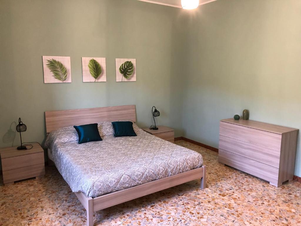 En eller flere senger på et rom på Casa Tatti