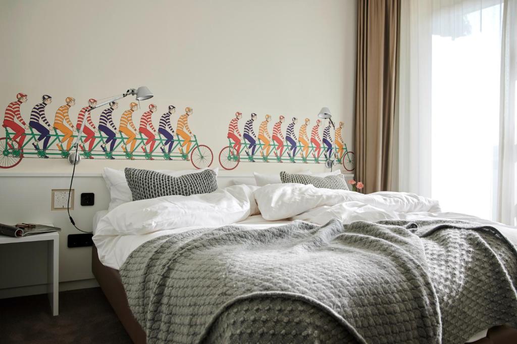 Postel nebo postele na pokoji v ubytování Hotel Haus am Meer
