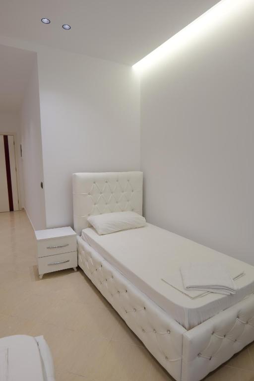 Postel nebo postele na pokoji v ubytování Hotel Dior