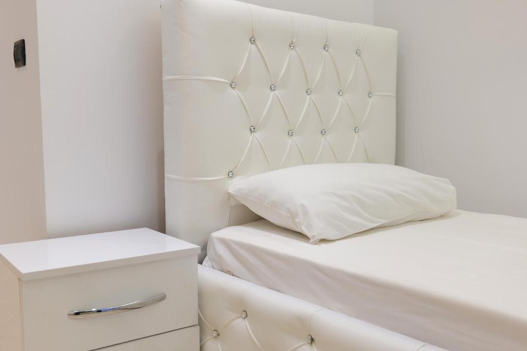 Postel nebo postele na pokoji v ubytování Hotel Dior