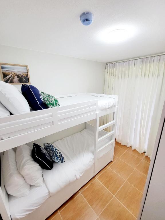 Kate's Corner @ One oasis Condo - Apartamento De Dos Dormitorios