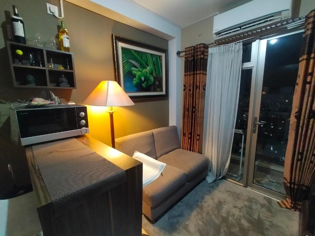 Кът за сядане в Apartemen 2br m-squere cibaduyut