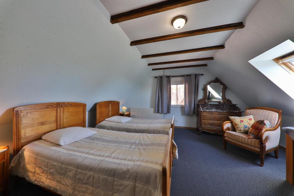 Postel nebo postele na pokoji v ubytování Gîte à La Montagne