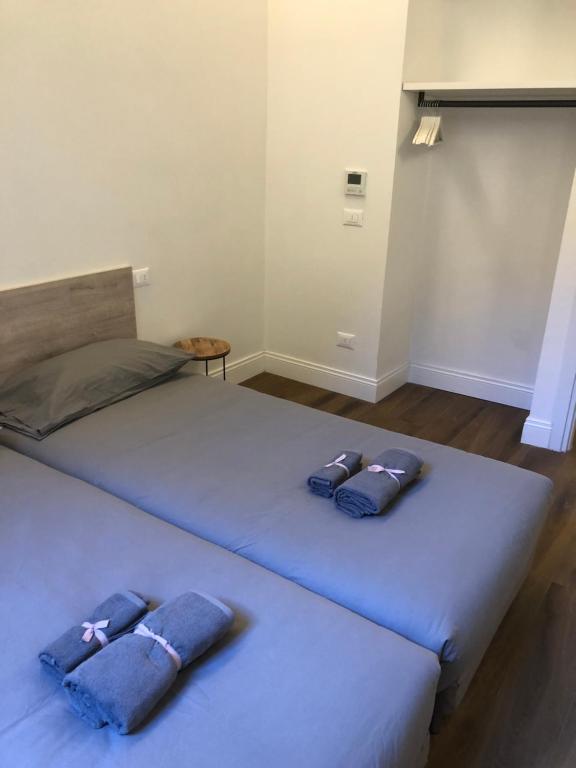 A bed or beds in a room at Novella Suite
