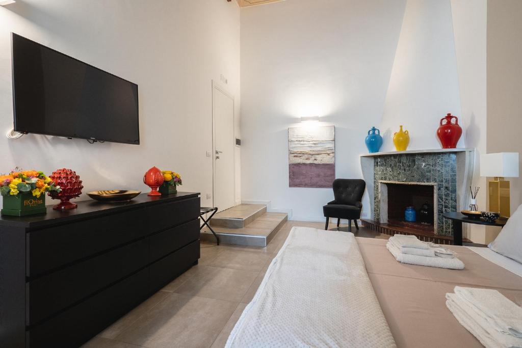 Telewizja i/lub zestaw kina domowego w obiekcie Fourooms - Bari Sparano
