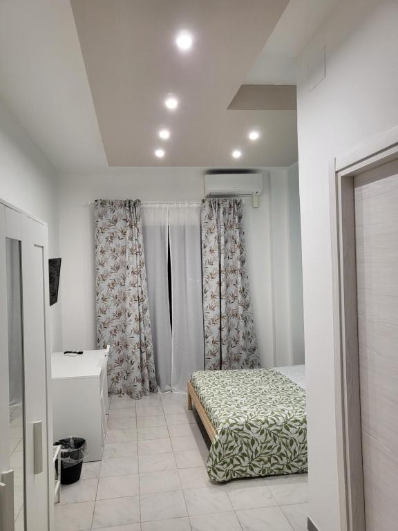 A bed or beds in a room at Sicula home