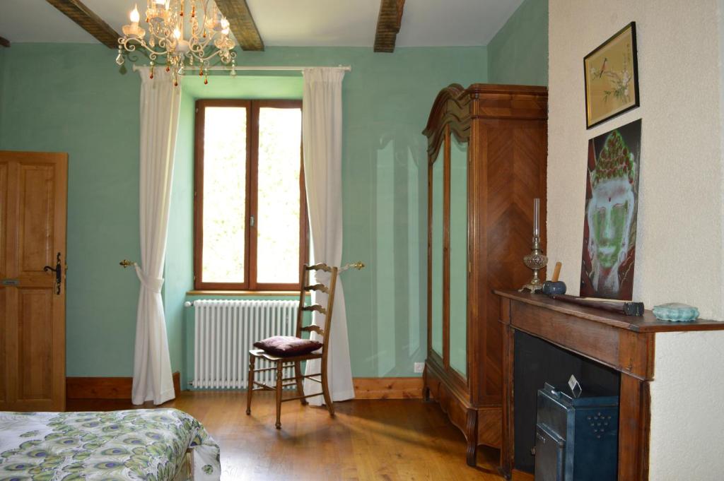 Postel nebo postele na pokoji v ubytování DUC MANOIR Chambres d'hôtes