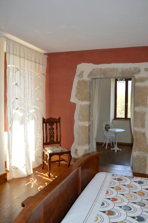 Postel nebo postele na pokoji v ubytování DUC MANOIR Chambres d'hôtes