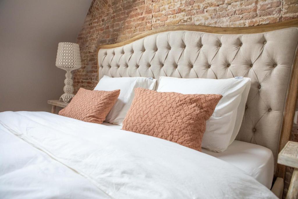 Кровать или кровати в номере Luxe appartementen Havenzicht