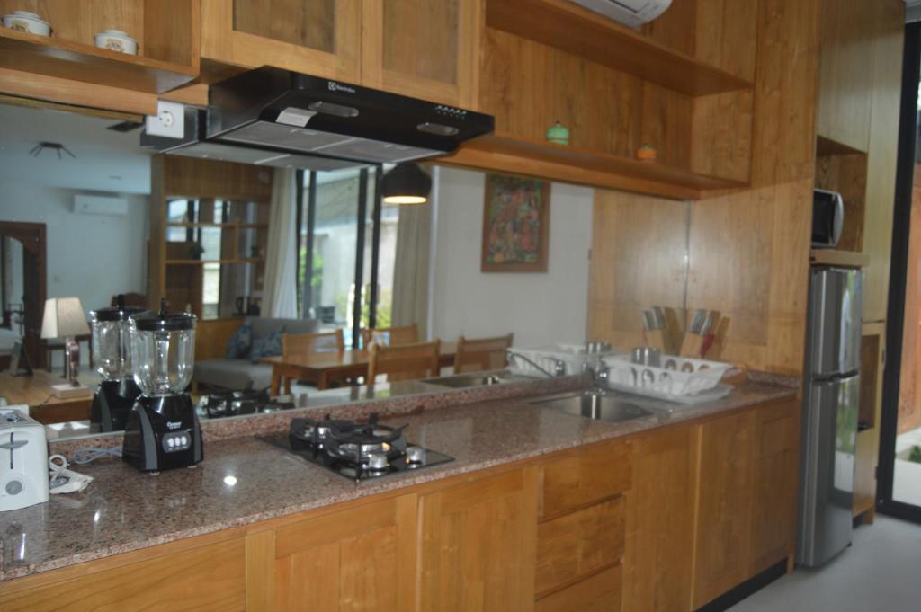 Kuchyň nebo kuchyňský kout v ubytování Serenity Private Villa Mas Ubud